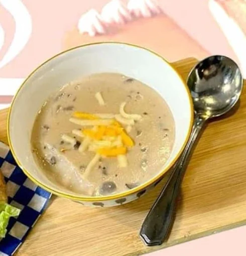 Creamy bowl with a spoon